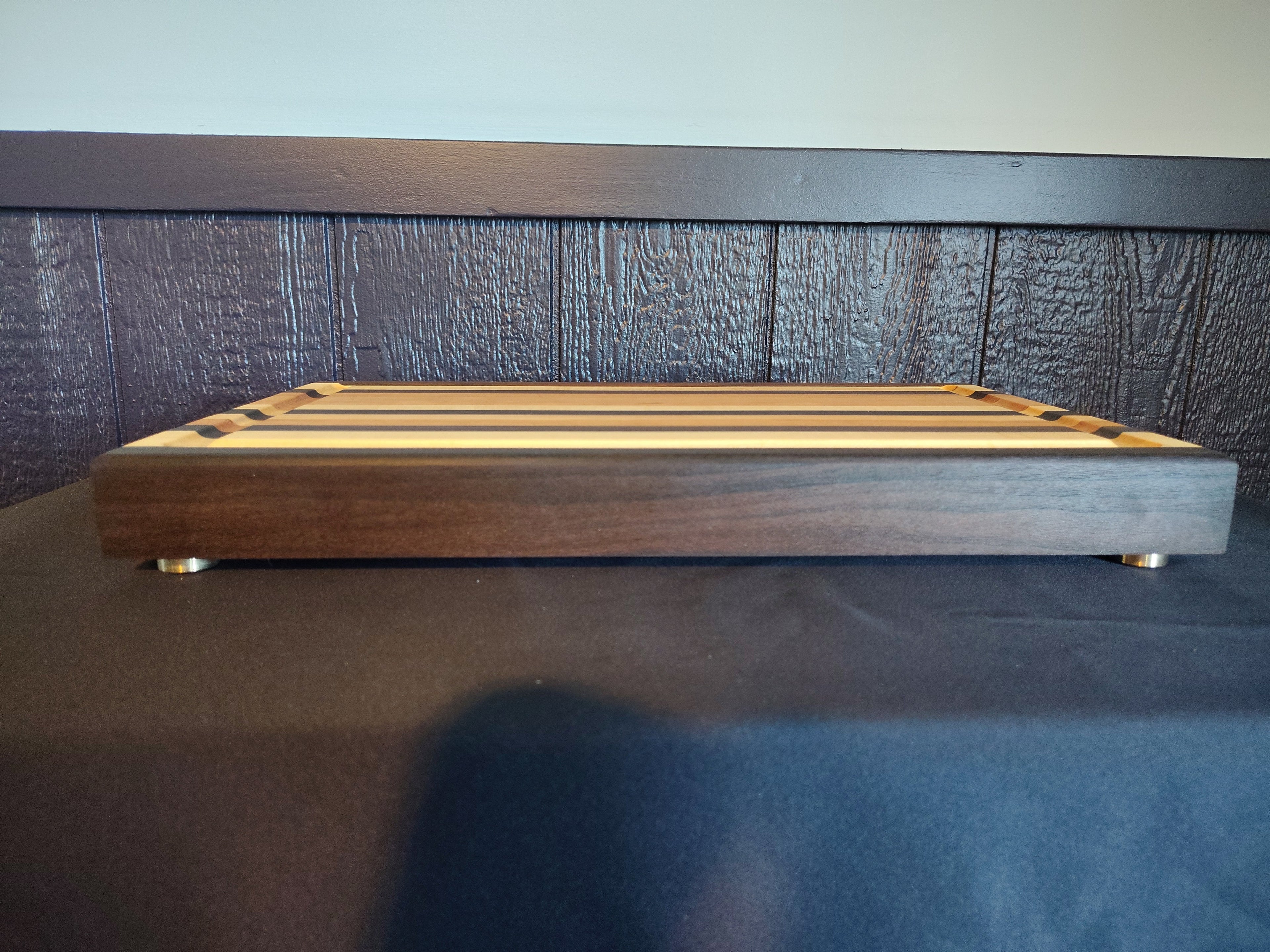 Handcrafted maple and walnut cutting board - bottom with rubber feet